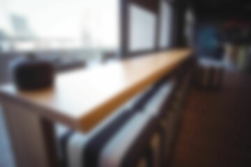 Defocused image of modern table in cafeteria