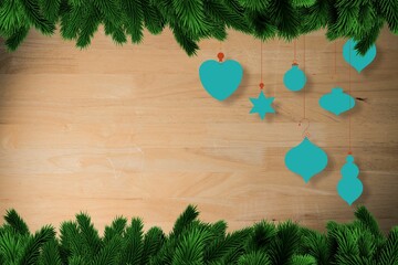 Christmas decorations over wooden planks