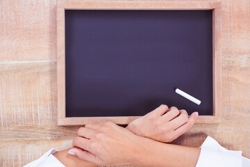 Hand writing on chalkboard © vectorfusionart