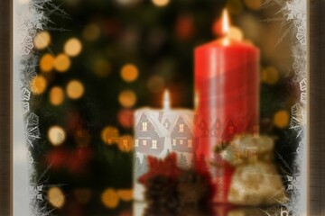 Christmas home seen through frosty window