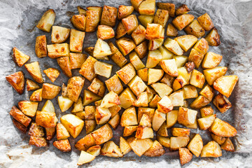 diced baby potatoes on tray after roasting, meal prep with healthy ingredients