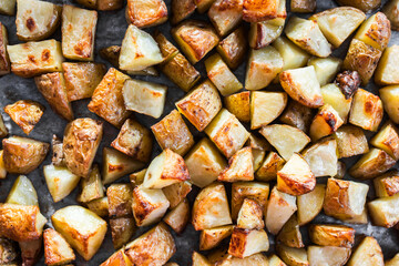 diced baby potatoes on tray after roasting, meal prep with healthy ingredients