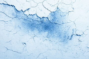 a blue paint on a wall with a white background