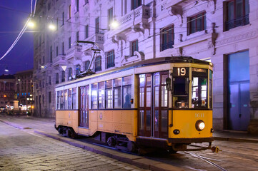 Naklejka premium Beautiful cityscape of a tram running in Milan, Italy