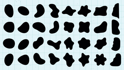 Abstract black shapes on a white background. Organic, irregular forms. Various blob-like, fluid shapes. Artistic, abstract design with unique shapes. Black shape vector set.
