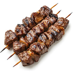 Grilled beef kabob with juicy chunks, perfectly cooked and isolated on a white background.