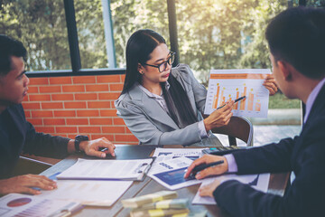 Startup businesswoman meeting, present and discuss the business plan marketing with her business partner. Selected focus