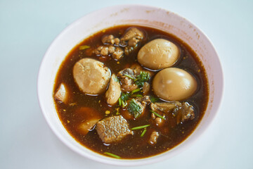 Close-up of  Thai Stew chicken meat with Eggs in bowl