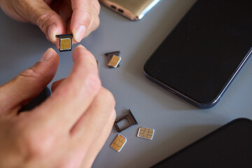 Detailed Process of Installing a SIM Card Utilizing Various Smartphone Components and Accessories