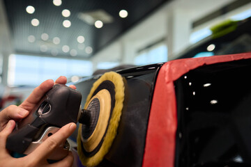 A Detailed Close Up of the Car Polishing Process in the Field of Automotive Detailing