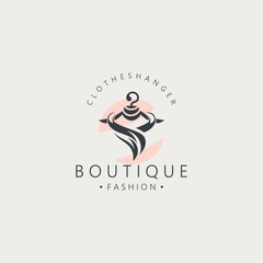 Obraz premium Clothes hanger logo design for business, boutique, lifestyle fashion clothing template