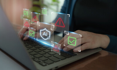 AI Safety and Ethics Concept. Typing on a laptop surrounded by digital icons; AI shields, warning signs, and checkmarks. Ethical guidelines and safety protocols in artificial intelligence systems.