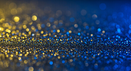 A luxurious abstract background featuring glowing golden light particles and bokeh effects over a rich navy blue backdrop.