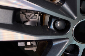 An Up Close View of a Stylish and Contemporary Car Wheel Featuring a Sporty Caliper
