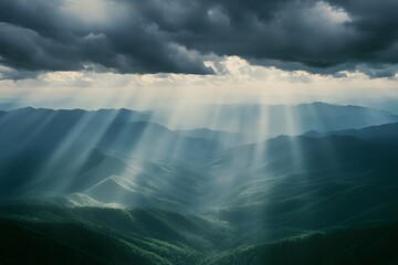 Fototapeta premium Mountains National Park in the United States, a beautiful view from the top with green mountains and clouds in the sky, sun rays shining through the dark grey 