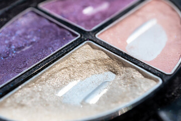 Eye contour palette. Makeup palette close-up. Eyeshadow palette, eyeshadow cosmetic product as...