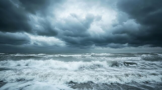 Storm clouds above the sea in winter, long exposure, dramatic sky, waves and water splashes