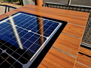 Technic design and modern trendy restaurant equipment where guest charges phone while drinking...