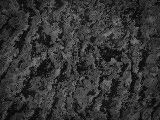 Dark marble with soft gray veins in an organic, fluid pattern for a sophisticated look.
