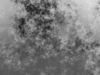 Metal grunge texture with dynamic dark and light cloud-like patterns.