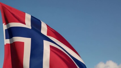 Close up of Norwegian flag waving against clear blue sky, national pride, Norway symbol, patriotic culture, Nordic heritage, travel, Scandinavian country, European destination, freedom concept