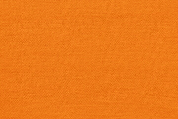 Orange fabric cloth texture for background, natural textile pattern.