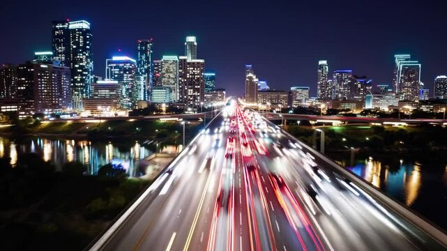 Vibrant light trails racing through a modern city skyline at night, symbolizing speed, urban energy, innovation, progress, and the nonstop rhythm of contemporary life