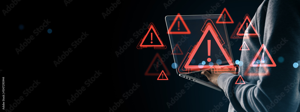 Poster Cybersecurity warning symbols with exclamation marks hovering over laptop used by anonymous person in hoodie on dark digital background.
