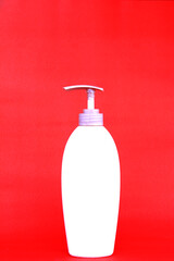 Refillable liquid soap pump bottle, with large white color and red background to make it look elegant.