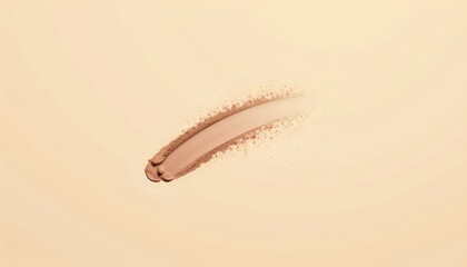 Obraz premium A close up of a brown eye shadow on a beige background.