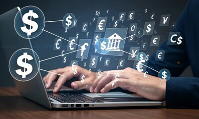 Hands Typing on a Laptop with Floating Currency Symbols - Powered by Adobe