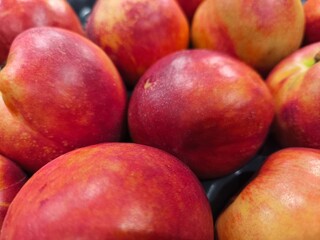 Close up picture of beautiful ripe peaches.