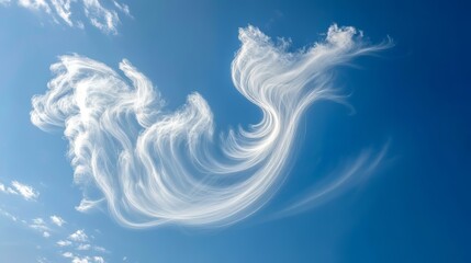 White curly clouds in the blue sky in sunny weather