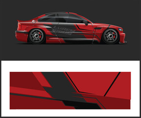 Obraz premium Red Sports Car with Black Racing Stripes and Matching Graphic Design