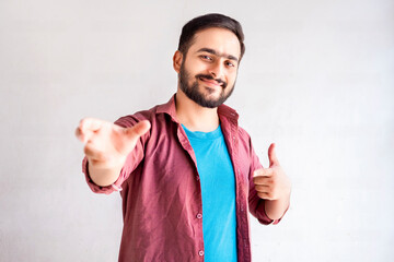 Confident Man Inviting You: A Powerful Gesture of Welcome