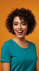 Smiling Woman with Curly Hair and Turquoise Shirt
