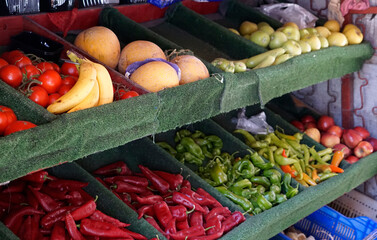 Fresh fruits fill vibrant street stand