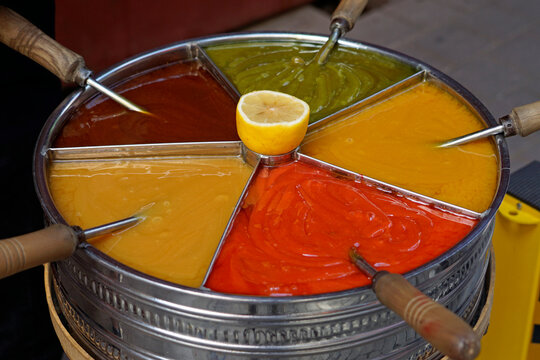 Colorful Turkish macun swirled in container