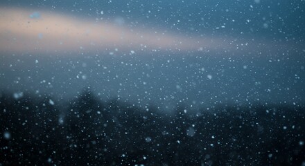 Obraz premium Ethereal Winter Twilight: Snowfall Over Silhouetted Forest