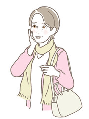 肩に鞄をかけ微笑む女性