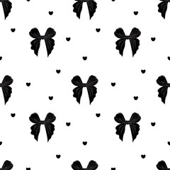 Seamless vector pattern with elegant black bows and small black heart on a white background. Stylish and feminine design perfect for fashion textiles, wrapping paper, gift packaging, stationery, and