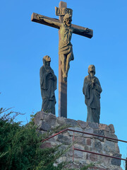 The Lord Jesus on the cross and two women under the cross in the garden at the Minor Basilica of...