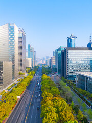 Aerial View of Shanghai skyscrapers with urban traffic.