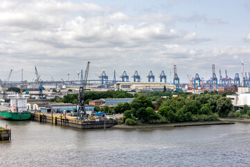 Industrial harbor. Port cranes. Maritime infrastructure.