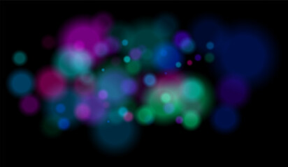Blurred particles with mixed color tones forming soft bokeh field. Abstract glowing circles on black background for dreamy effects.