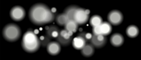White blurred bokeh particles with varying size and opacity on black background. Abstract design element for festive or sci-fi scenes.