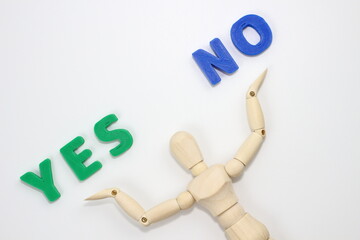 デッサン人形とYES or NO、思考を促す一枚