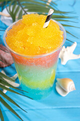 Colorful slushie drink, multicolored frozen juice cocktail