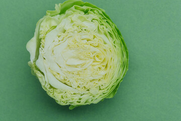 Fototapeta premium Closeup of halved cabbage showing detailed leaf structure