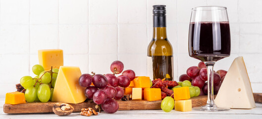 Tasty delicious cheese and appetizers board